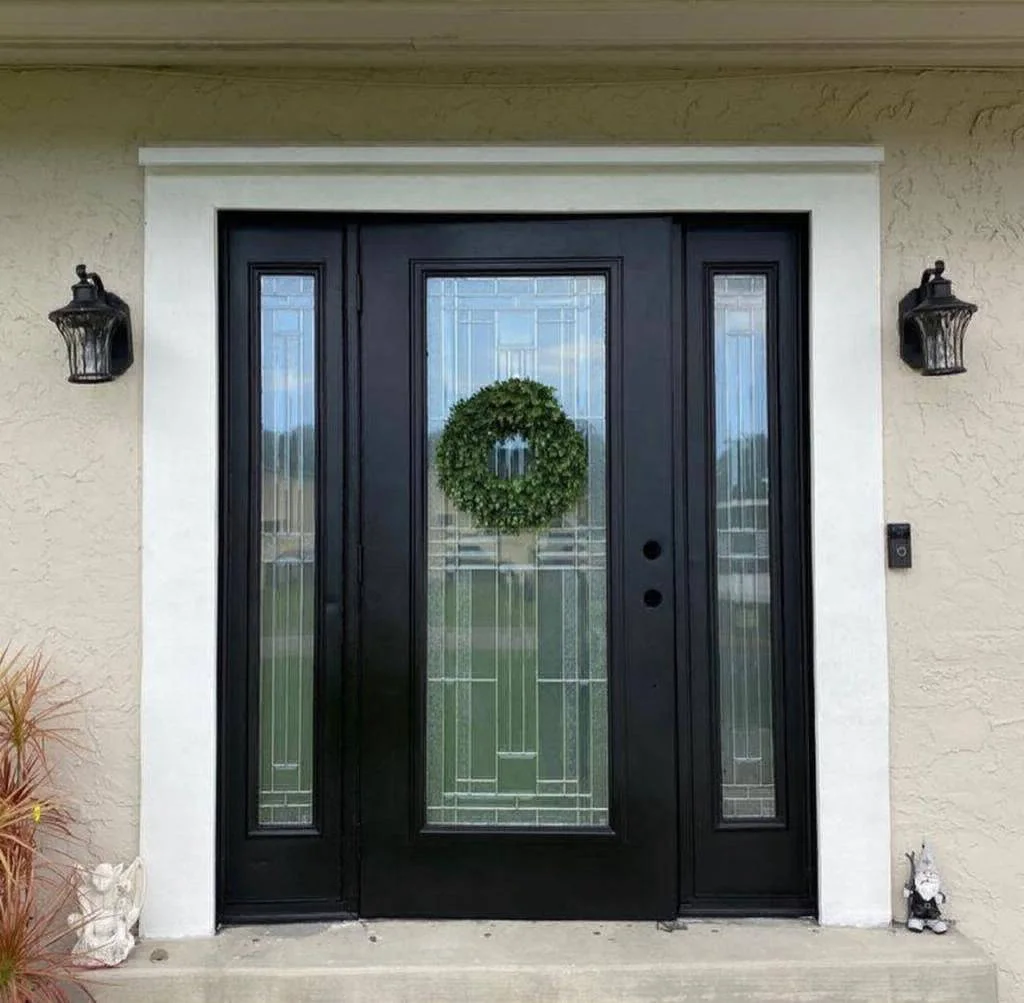 New black double front doors with decorative glass
