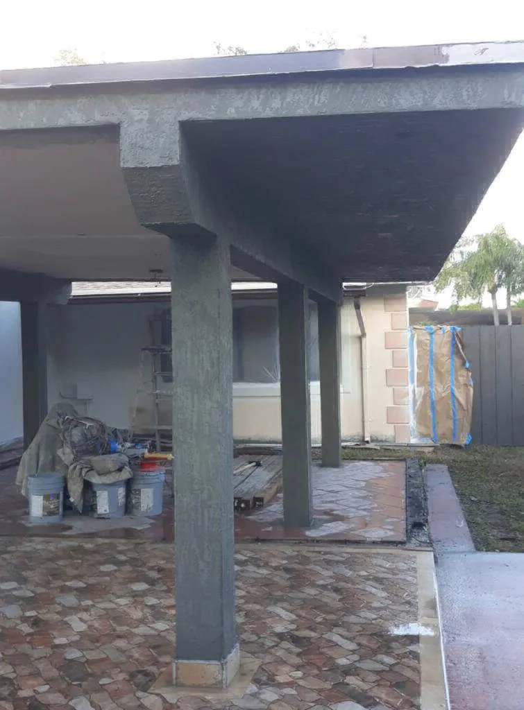 Patio cover project mid-build with fresh lumber